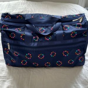 LeSportsac Large Weekender bag, blue with rainbow hearts